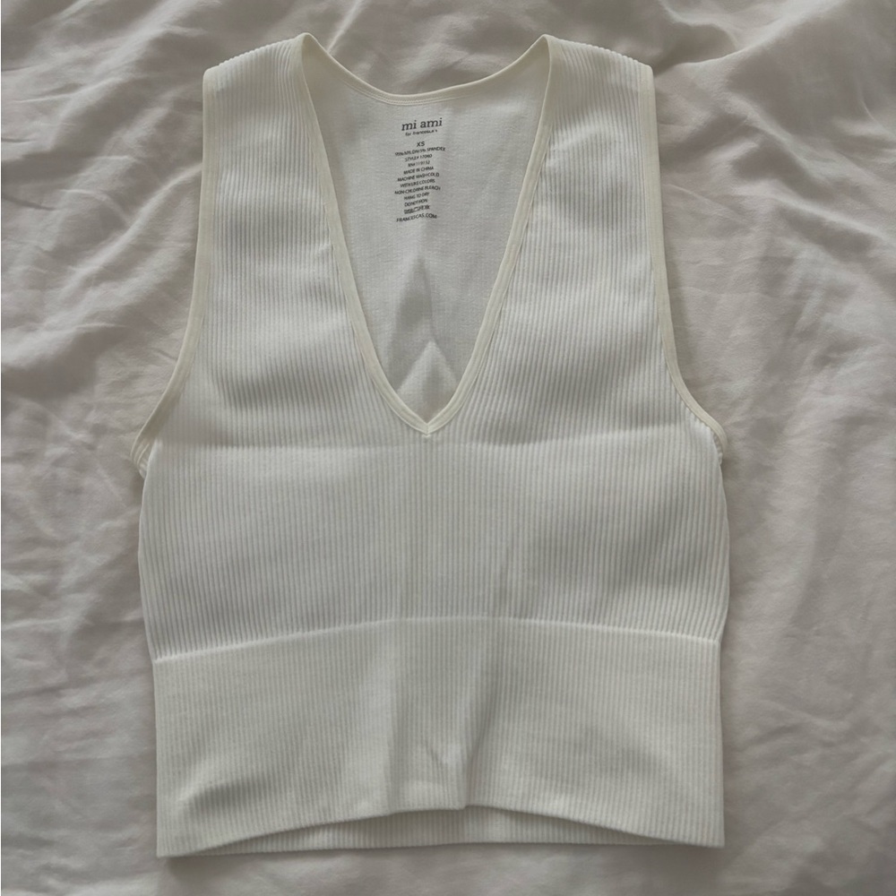 Francesca’s white tank top